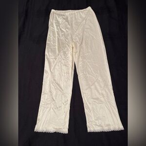 Vintage off white full length pull on pants liner with lace trim, size S/M.